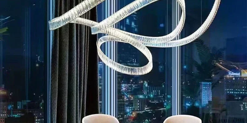 Crystal ribbon chandelier adorns the dining table in a fine dining restaurant